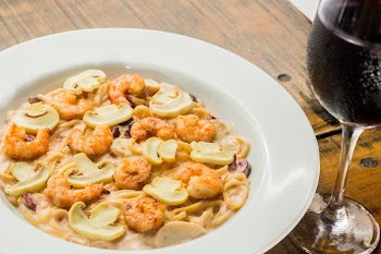 Mushroom Soup on Plate Beside Wine Glass
