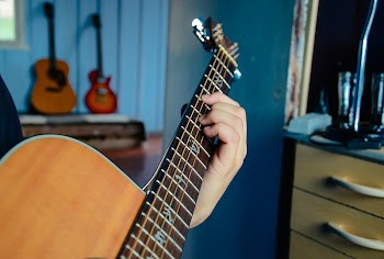 Musician playing guitar, music background.Free | Free Photo - rawpixel