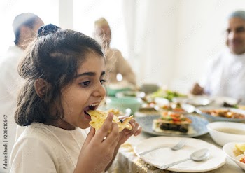Muslim family having a Ramadan feast