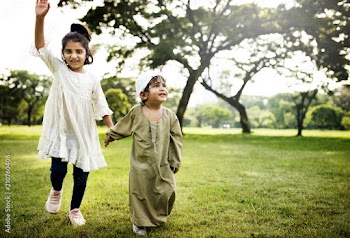 Muslim kids running in the park
