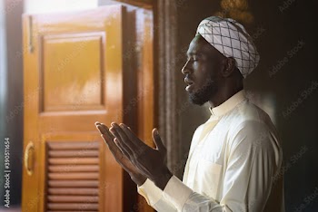 muslim man having worship and praying for allah blessing in islam ceremony in mosque during islamic ramadan period