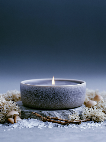Mystical Candle in a Dark Ceramic Jar