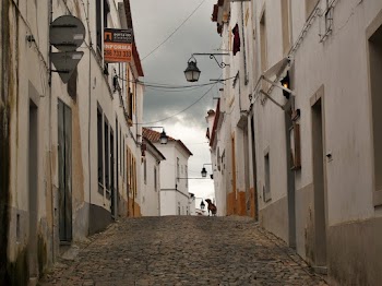 Narrow Street Between Concrete Houses