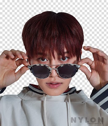NCT , male artist holding brown and black framed sunglasses transparent background PNG clipart
