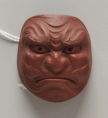 netsuke in the form of a mask; | Free Photo - rawpixel