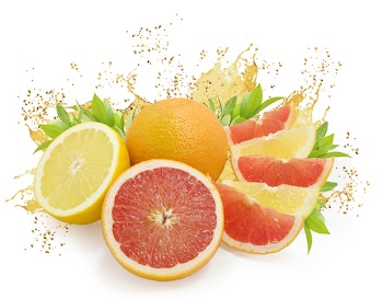Nice fresh citrus fruits with green leaves and juice drops isolated on white