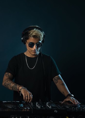 Night Club DJ Making Music
