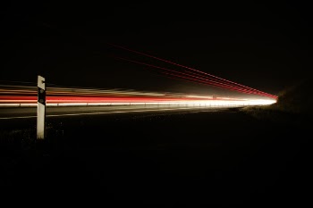 Night Photo of Car Lights on Bridge