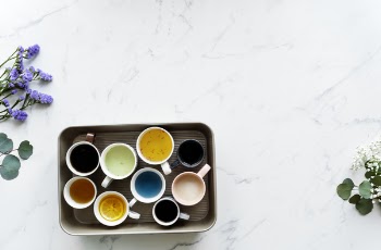 Nine White Ceramic Mugs