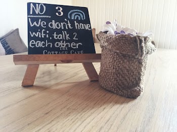 No 3 We Dont Have Wifi Talk 2 Each Other Text on Black Board