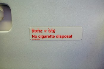 No Cigarette Disposal Signage