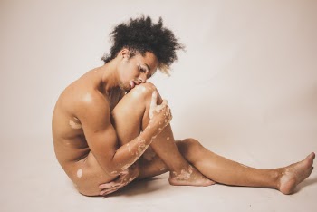 Nudity Photography Sitting Man Kissing His Knee