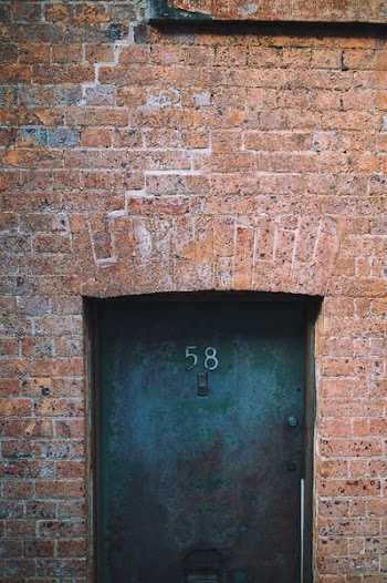 number 58 black door