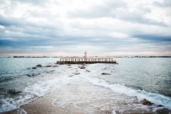 Ocean Under Cloudy Sky
