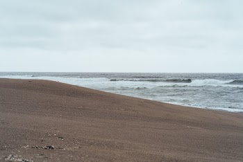 Ocean Under Cloudy Sky