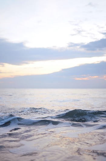Ocean waves at sunrise 