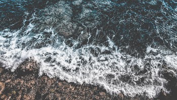 Ocean Waves Slamming on the Rocks Time Lapse Photography