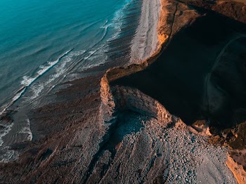 ocean waves under sunny sky