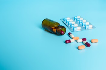 Of medicines, medical supplies placed on a blue  . Free Photo