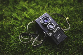 Old camera on the grass