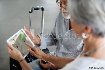 Old couple travel map route