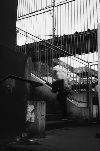Old Person on Stairs