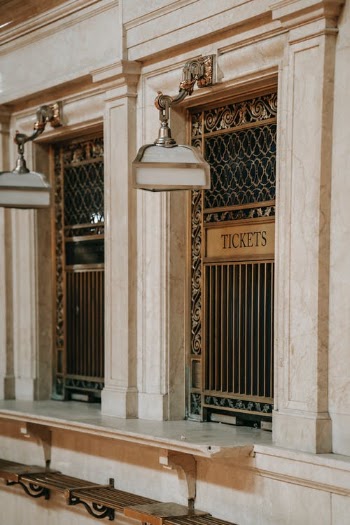 Old railway station with ticket windows · Free Stock Photo