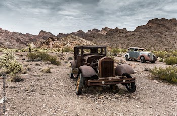 Old vintage car truck abandoned in the desert
