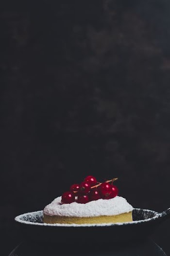one slice of cake in black bowl