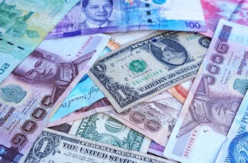 One U.s. Dollar Beside 100 Philippine Pesos