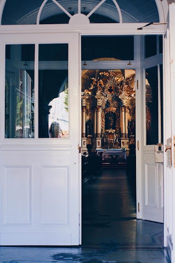 Open Door Leading to a Cathedral