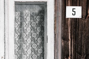 open window with lace curtain
