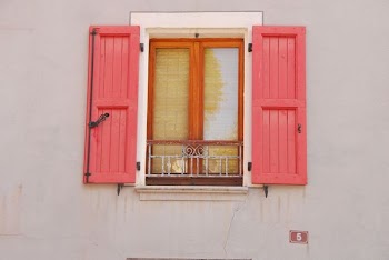 opened red wooden window doors