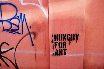 orange and black hungry for art graffiti