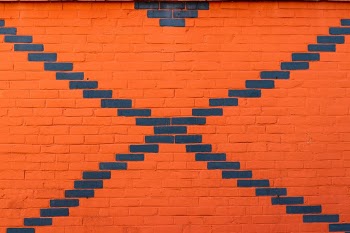 orange and blue brickwall