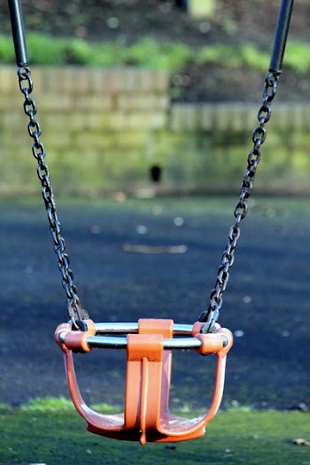 Orange and Gray Bucket Swing