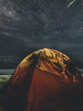 Orange and Green Camping Tent Under Starry Sky
