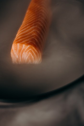 Orange and White Pastry on White Ceramic Plate