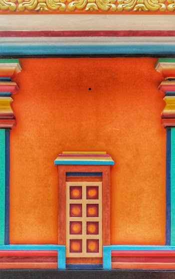 Orange, Blue, and White Concrete Building