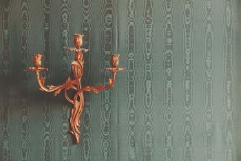orange candlestick holder