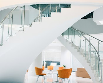 Orange Chairs Near Staircase