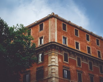 Orange Concrete Building during Day