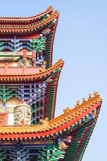 orange, green and blue pagoda temple