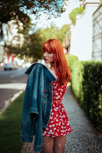 Orange Haired Woman on Pavement