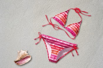 Orange Pink White Stripe Bikini Near Shell on Sand Beach