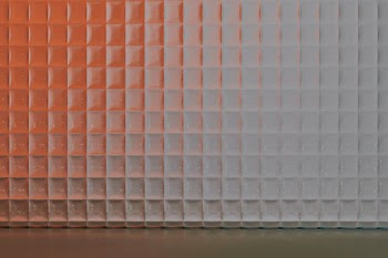 Orange product backdrop with patterned glass | Free stock photo | High Resolution image