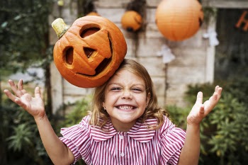 Orange Pumpkin on Girl's Head 