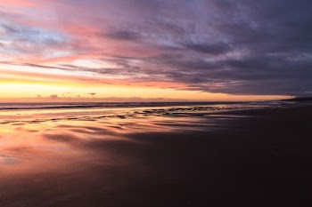 orange sunset in ocean