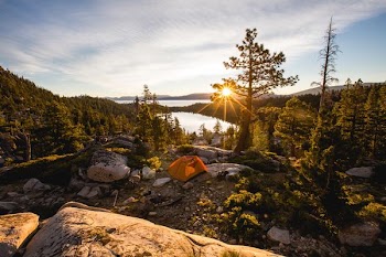 orange tent on gray mountain