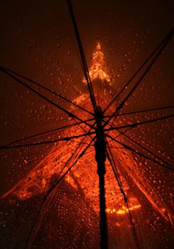 orange umbrella with drops